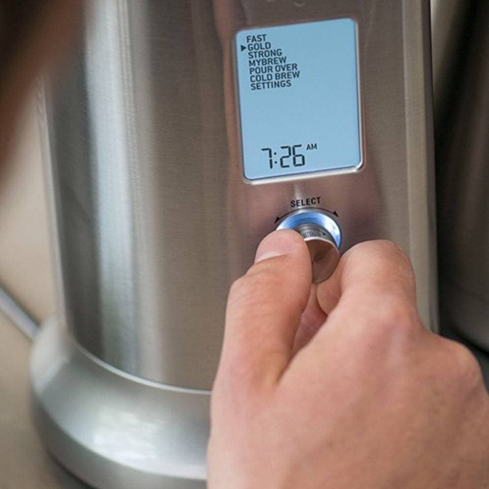 Coffee maker displaying time
